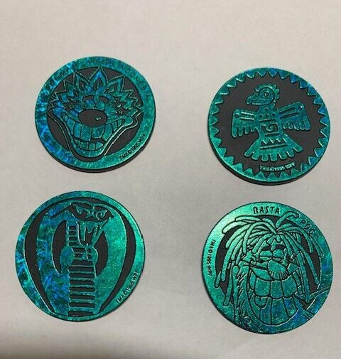 4 Metalic Green colored vintage pogs from The World Pog Federation 1995