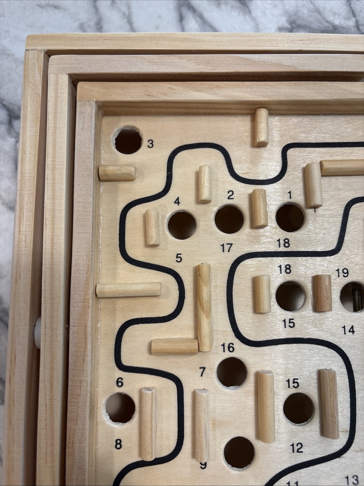 Labyrinth wood tabletop game.