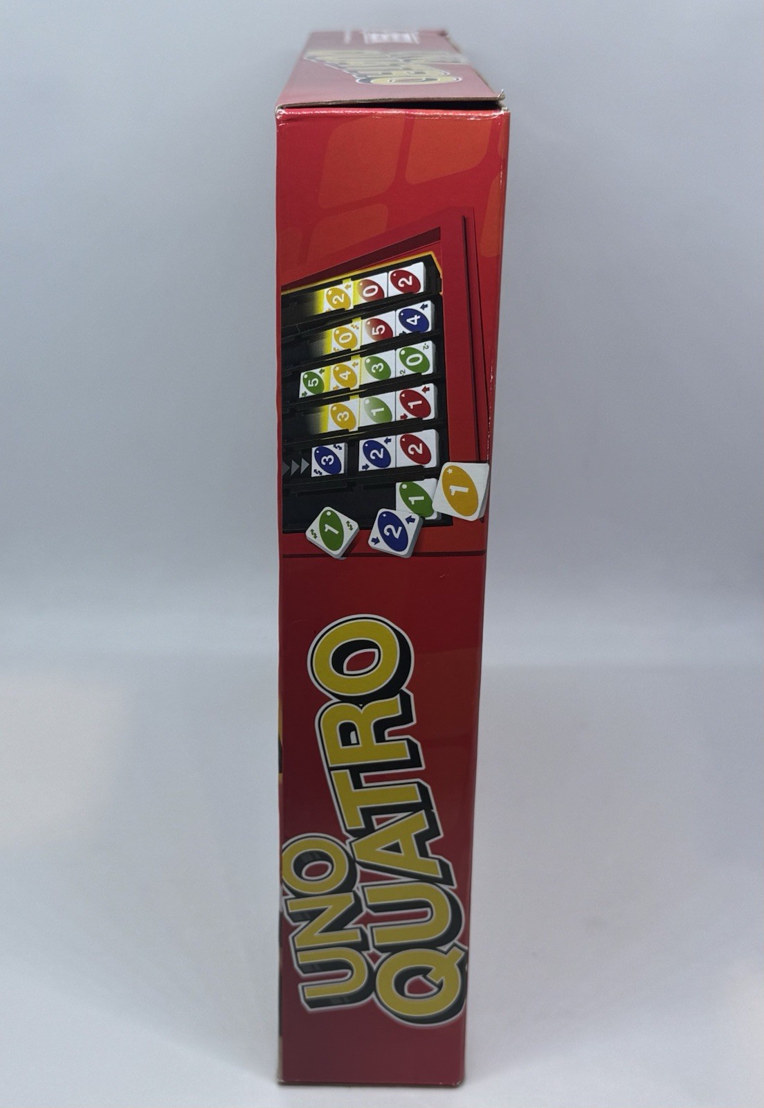 Mattel Games UNO Quatro Game with Colored Tiles & Plastic Grid for Family