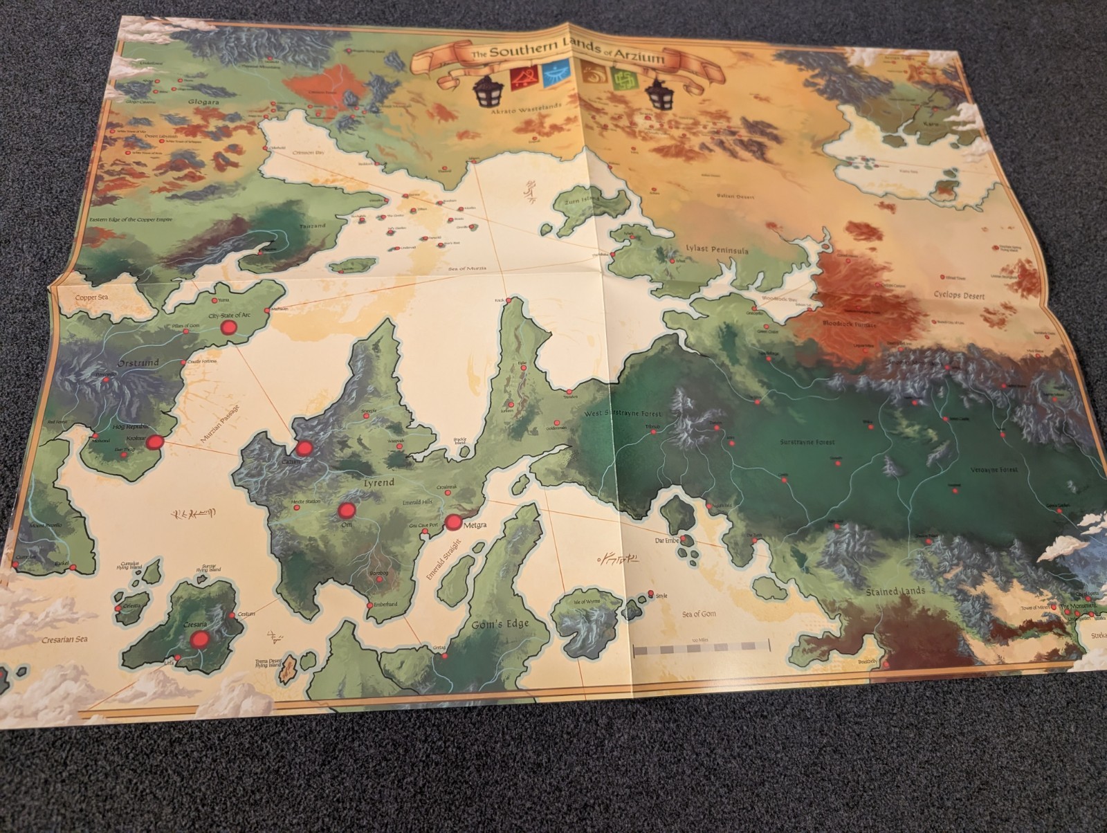 The Southern Lands of Arzium 22×16 Poster, Creature Caravan Deluxe: Red Raven