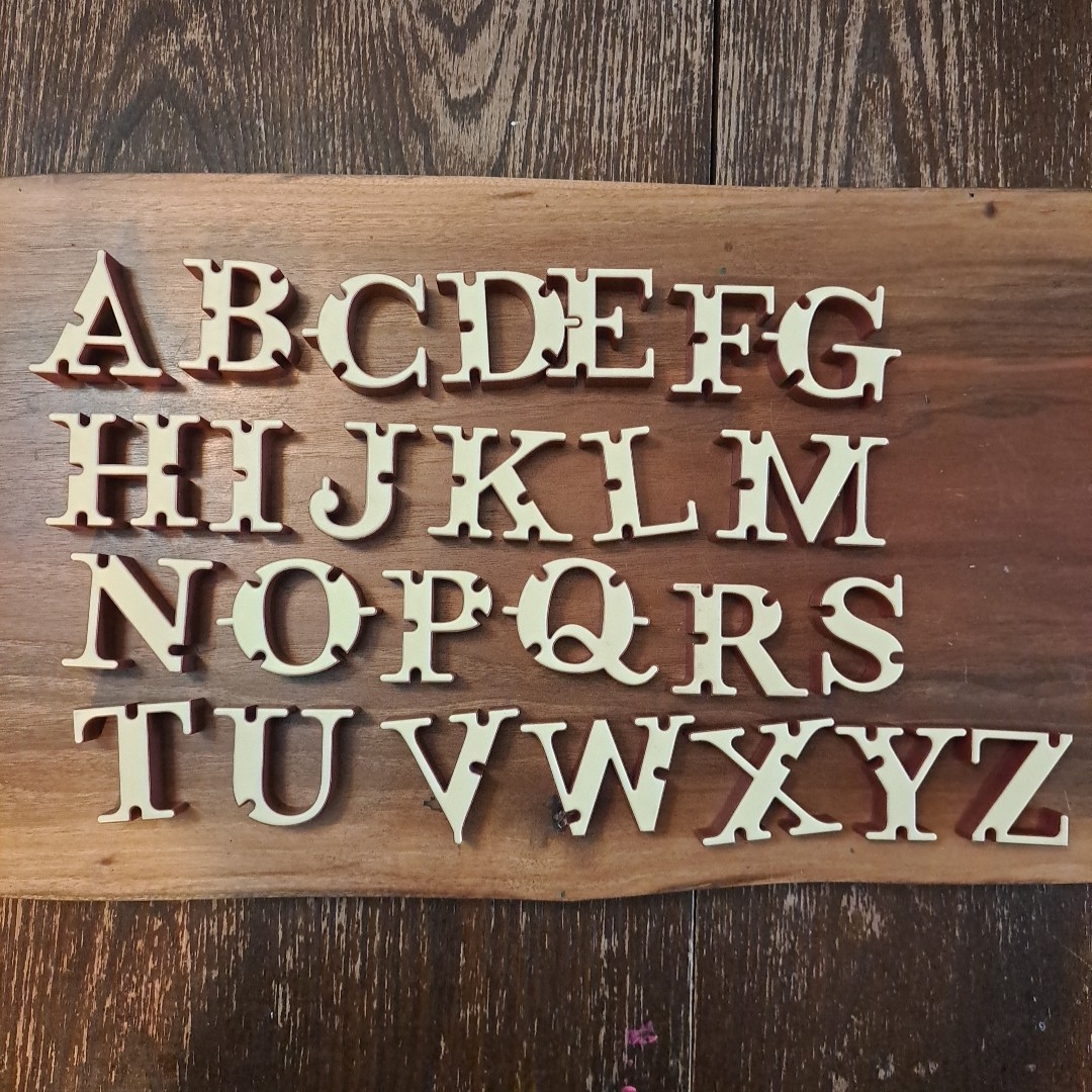KONEXI The Gravity-defying Word Game by Zamala LETTERS ONLY