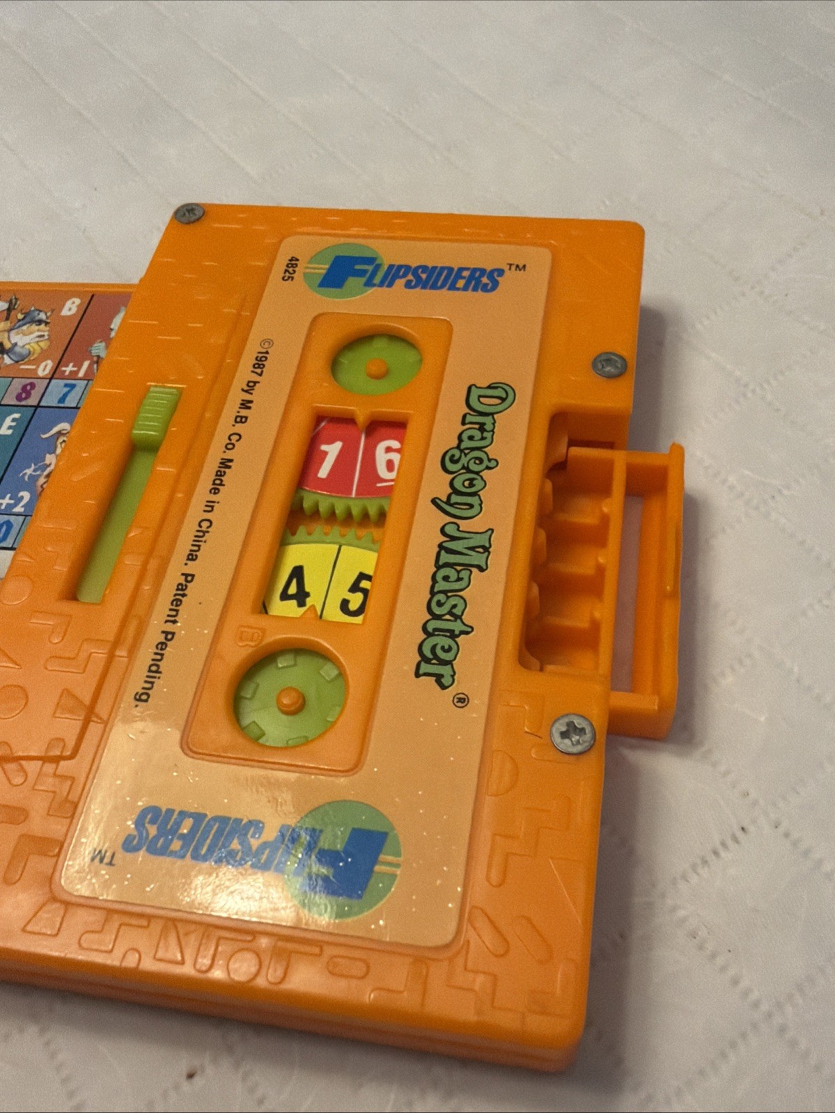 VTG 1987 Milton Bradley Flipsiders Pocket Game Dragon Master Orange