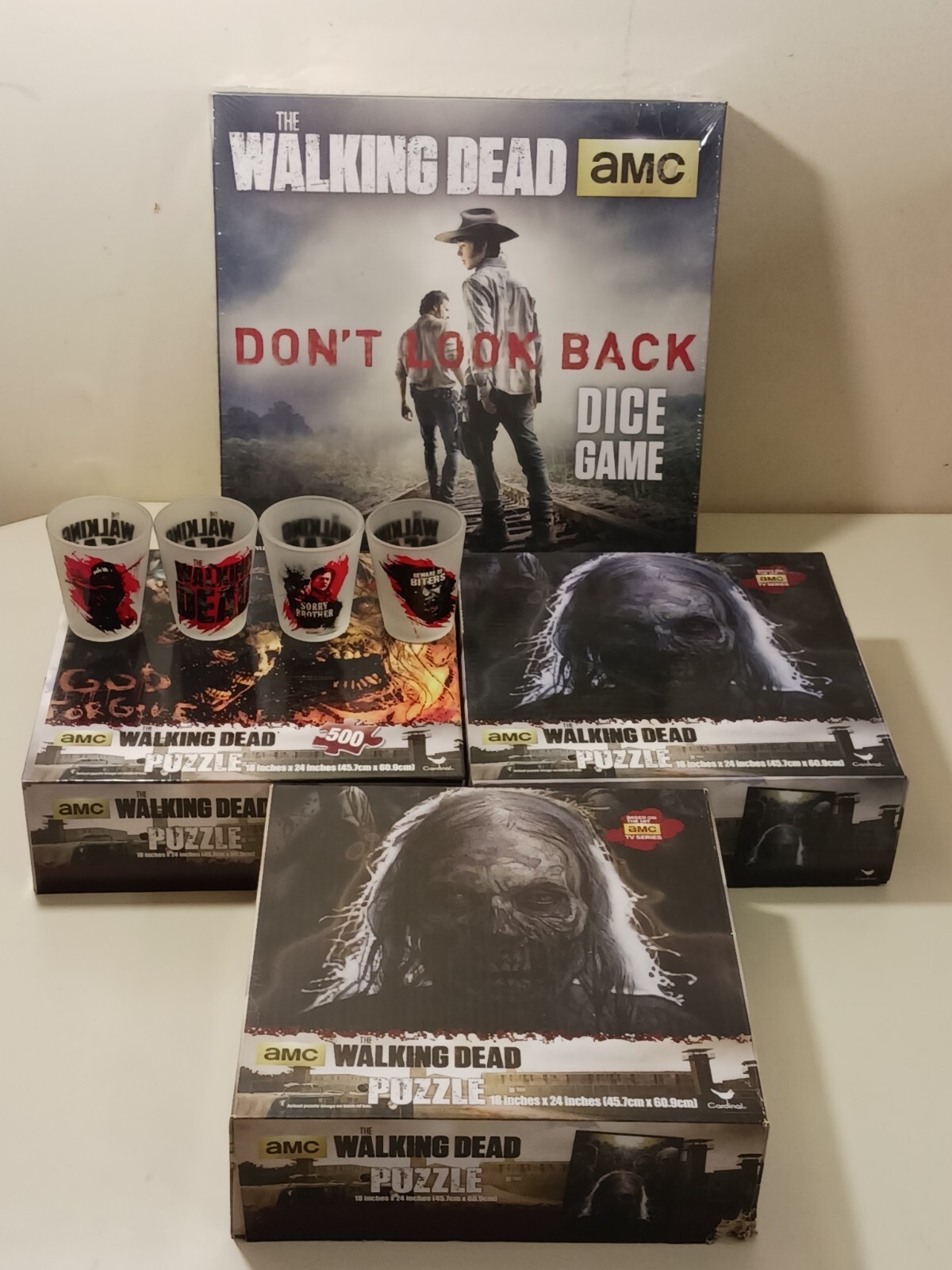 The Walking Dead Lot 4 Shot Glasses 1 Dice Game 3 Jigsaw Puzzles 1 Wall Clock