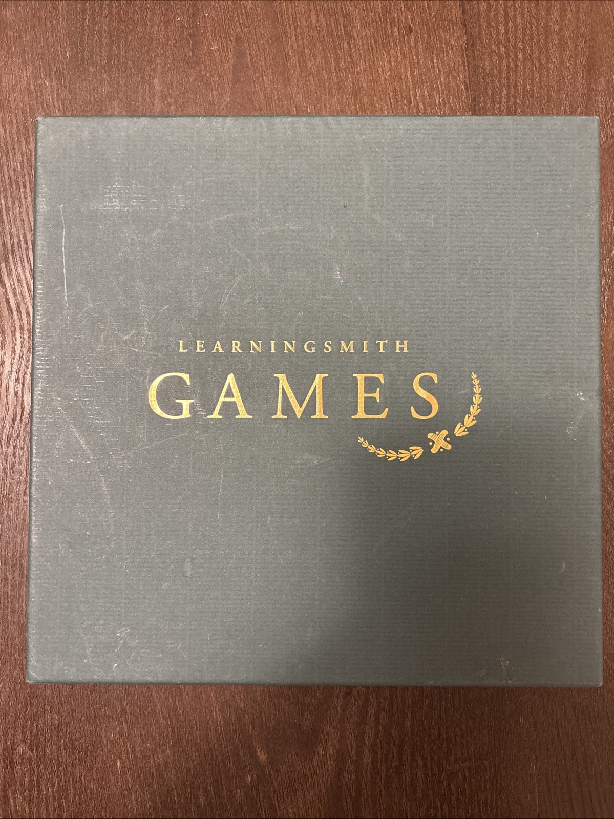 Learningsmith containing a tic-tac-toe game, 9-piece set