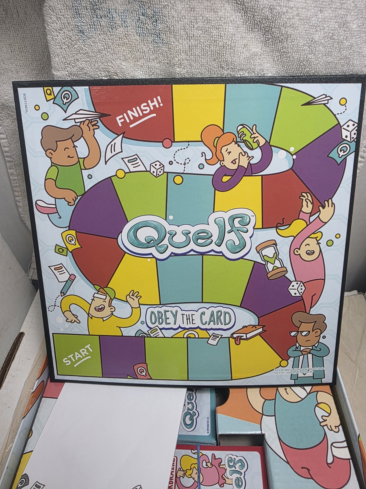 Spinmaster ” Quelf” Interactive Multi Player Board Game ( Complete)
