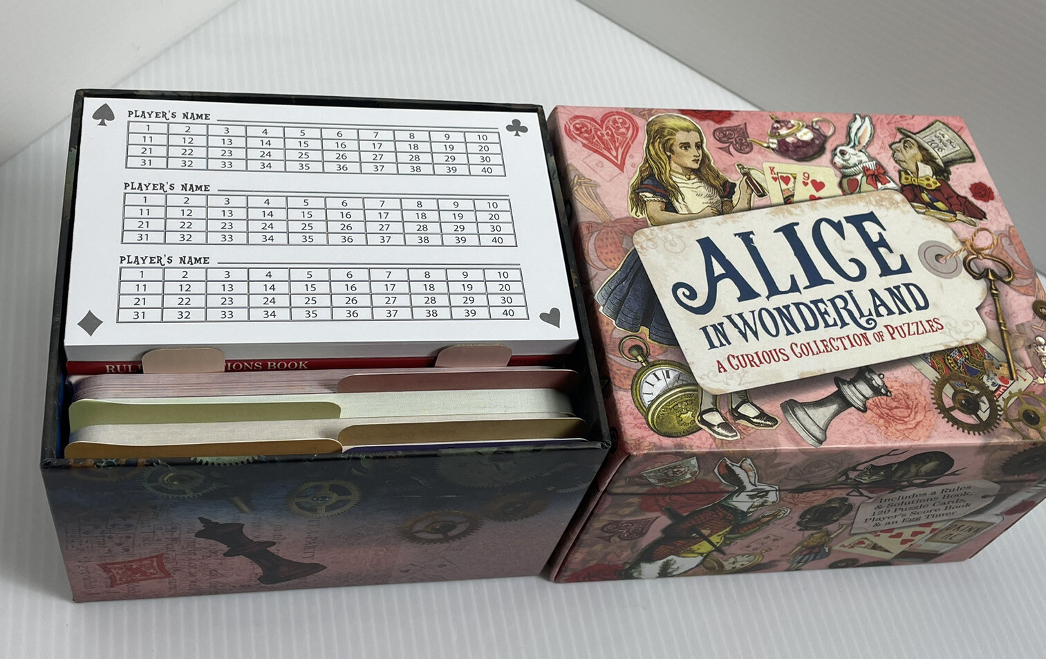 Sterling Innovation Alice in Wonderland Collection of Puzzles Trivia Game Open