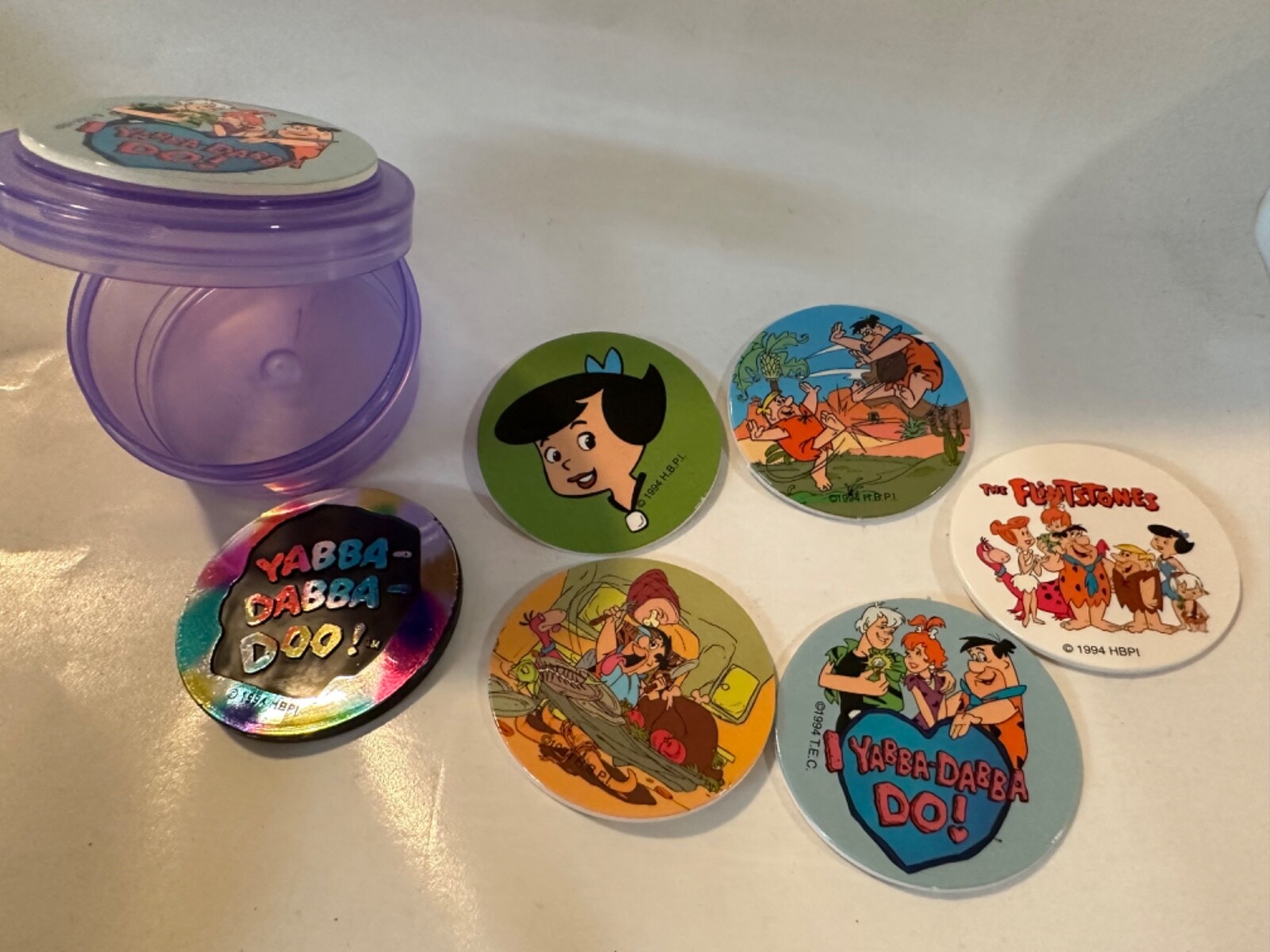 Flintstones Pogs ONE container, with 5 pogs and one plastic slammer RANDOM