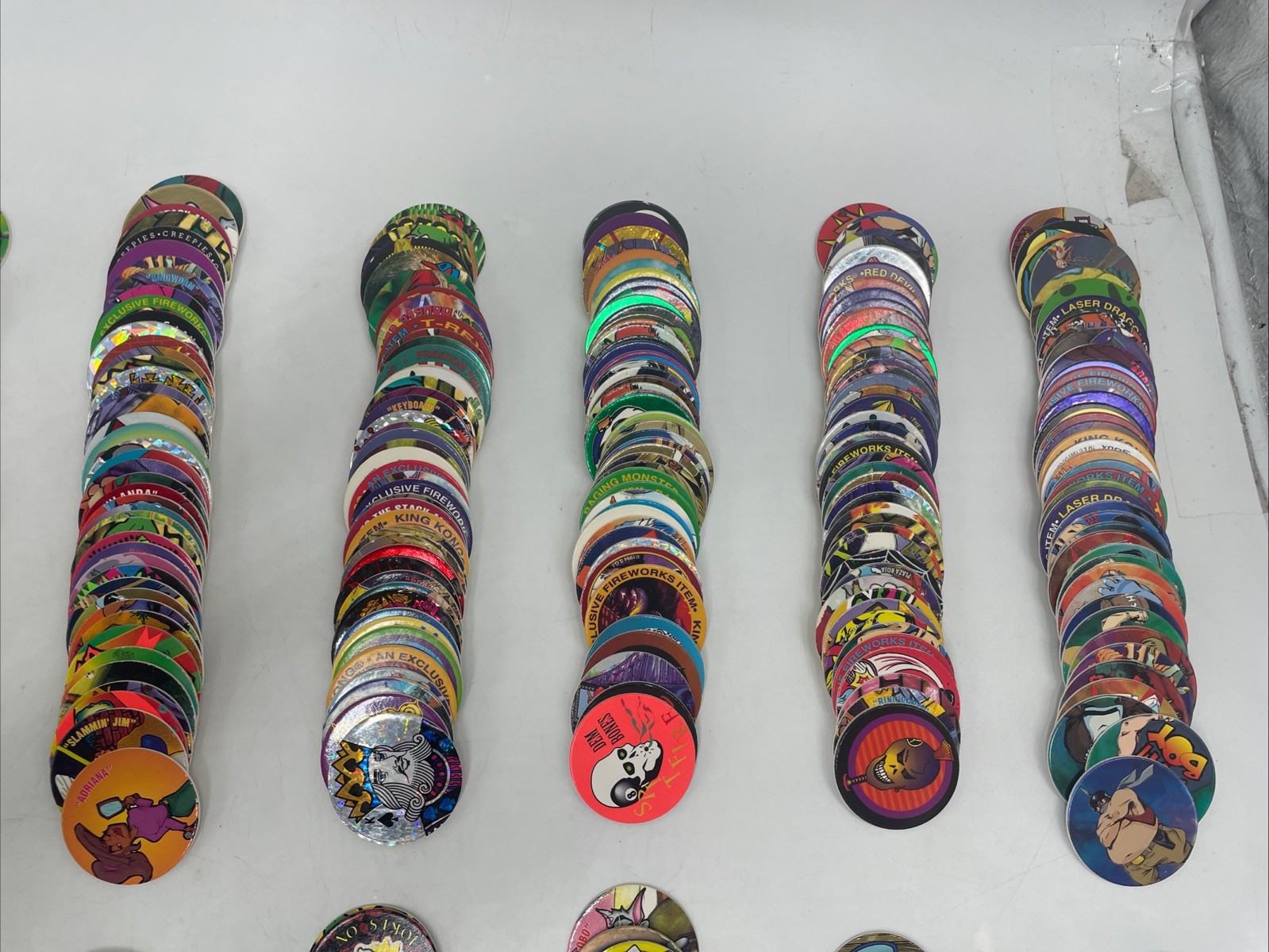 Large POGS Lot (825+ Milk Caps, 130+ Slammers, 10 Game Pads, 13 Tubes)