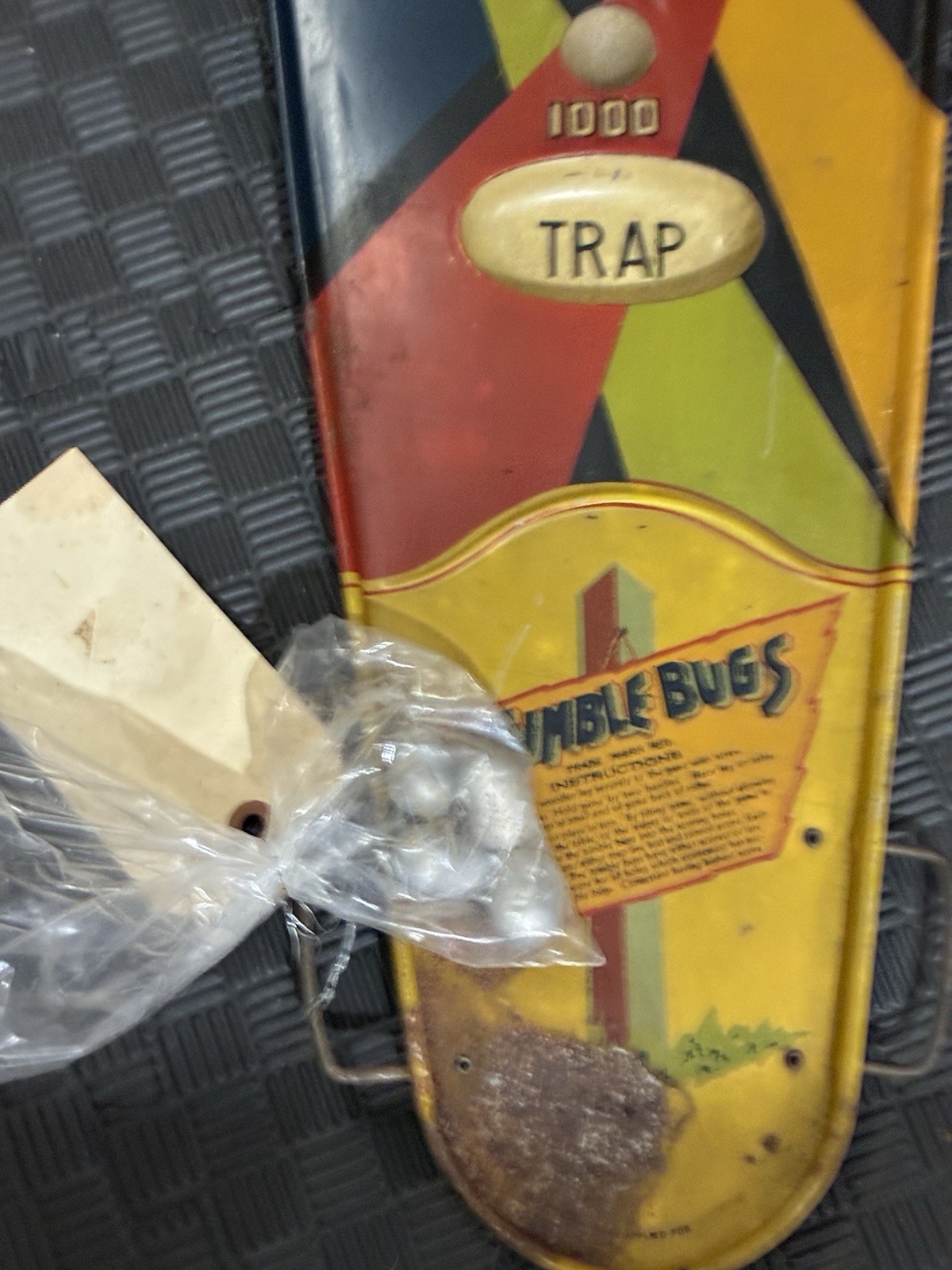 vintage “Tumble Bugs” tabletop game from the early 20th century.