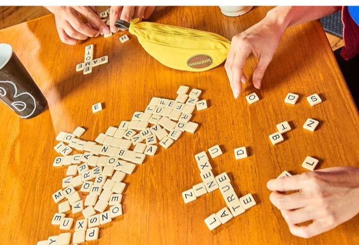 NEW Bananagrams Classic Word Tile Game – Fast-Paced Family Fun in Banana Pouch