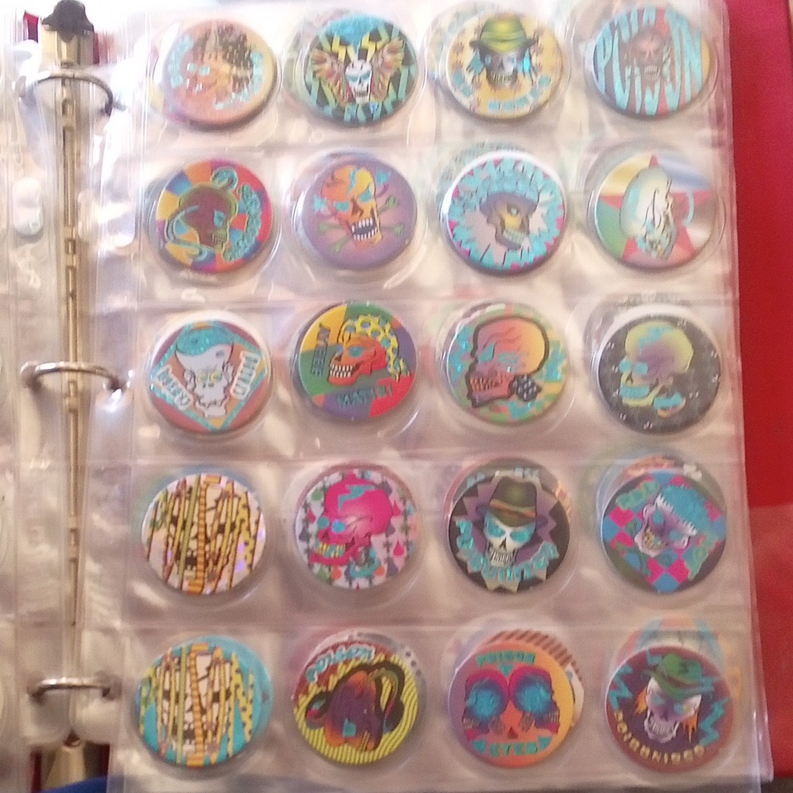 Pogs Collectible Game Pieces Skull Theme Lot w/ Binder Sleeves/Pages