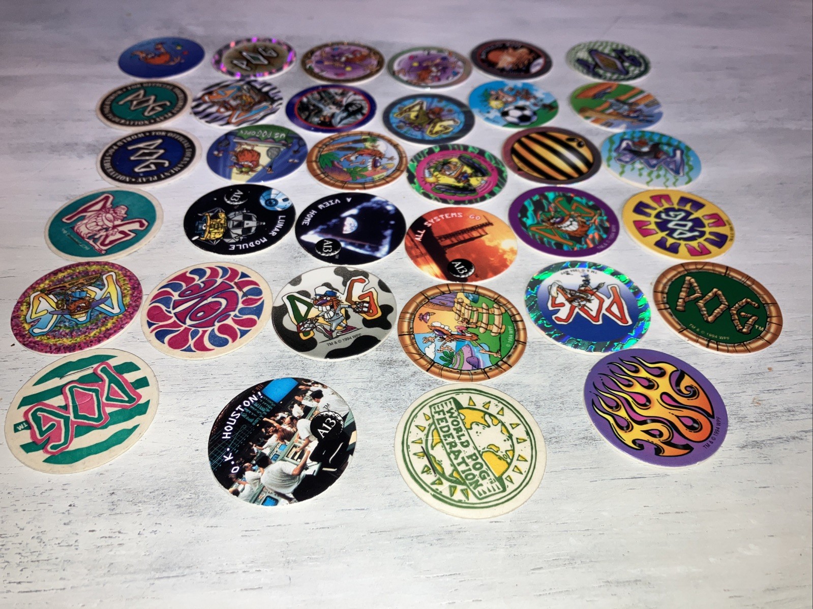 Lot of 34 Pogs from 1994/95 The World Pog Federation Authentic POG Brand WPF