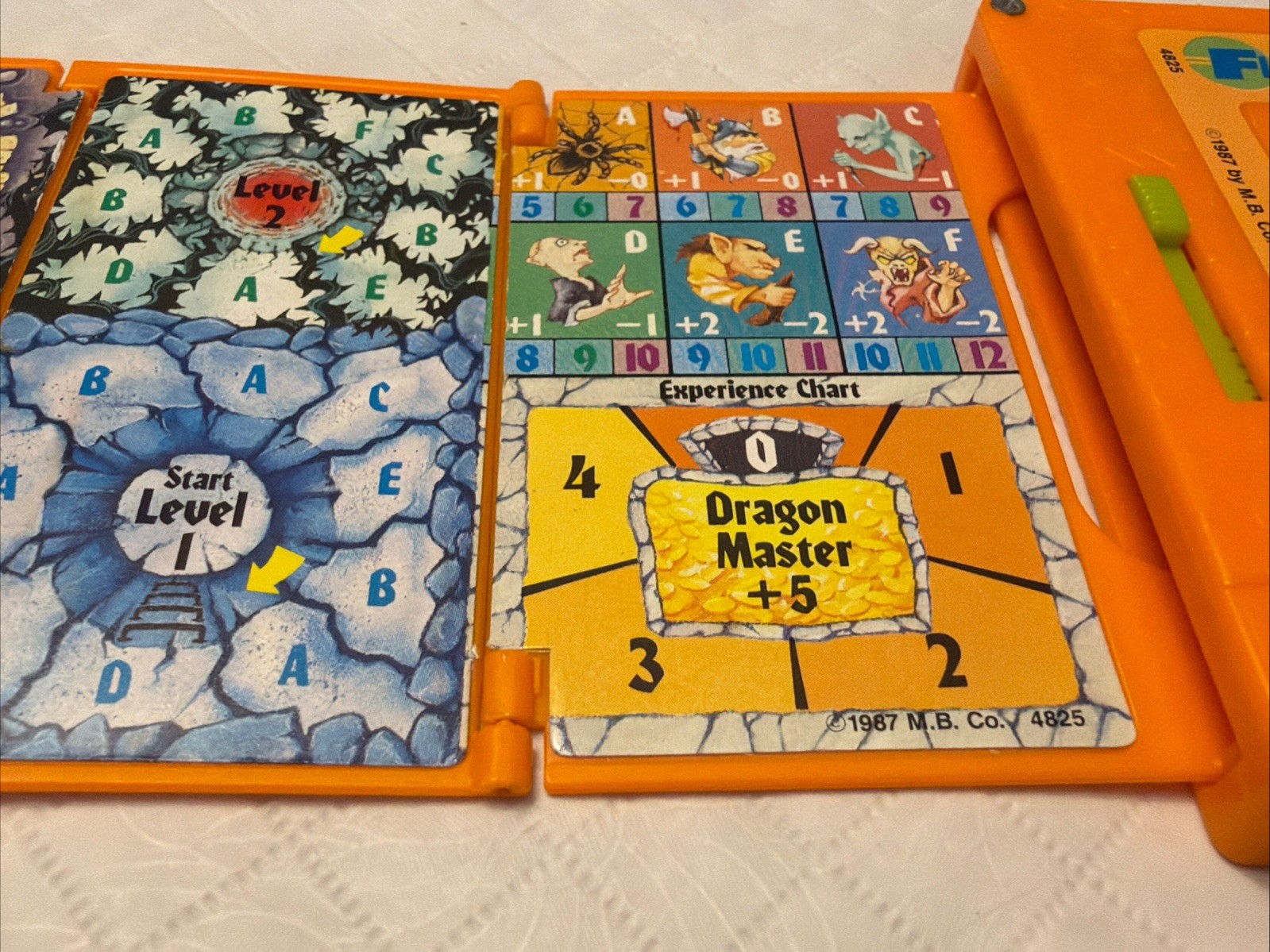VTG 1987 Milton Bradley Flipsiders Pocket Game Dragon Master Orange