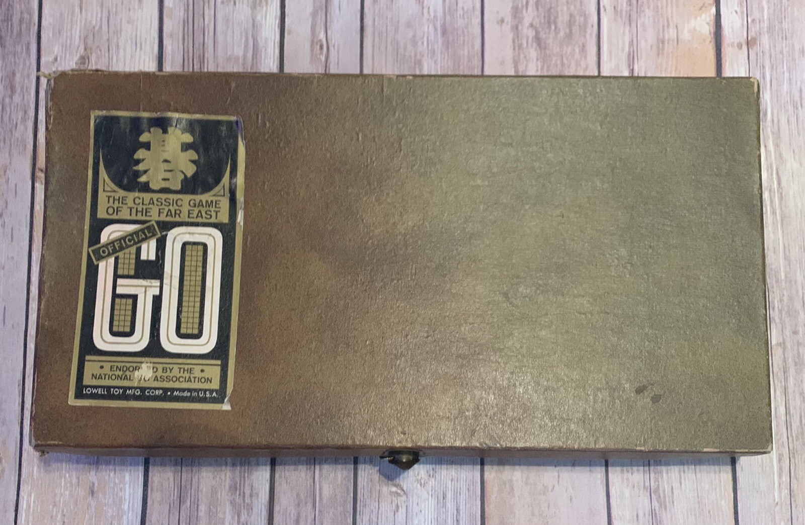 Official Go Classic Game, in fair condition, Lowell Toy Mfg Corp.