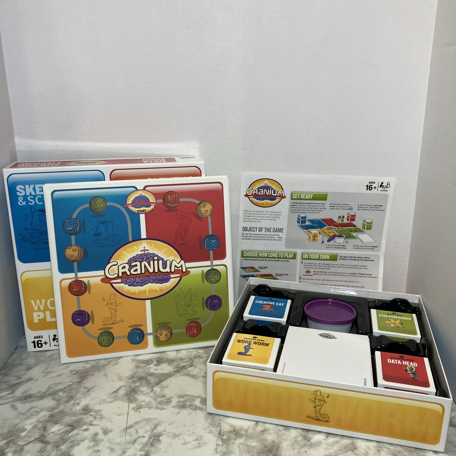Hasbro Cranium 3-in-1 Foldout Board Game Adult 16+ 600 New Cards Open Box