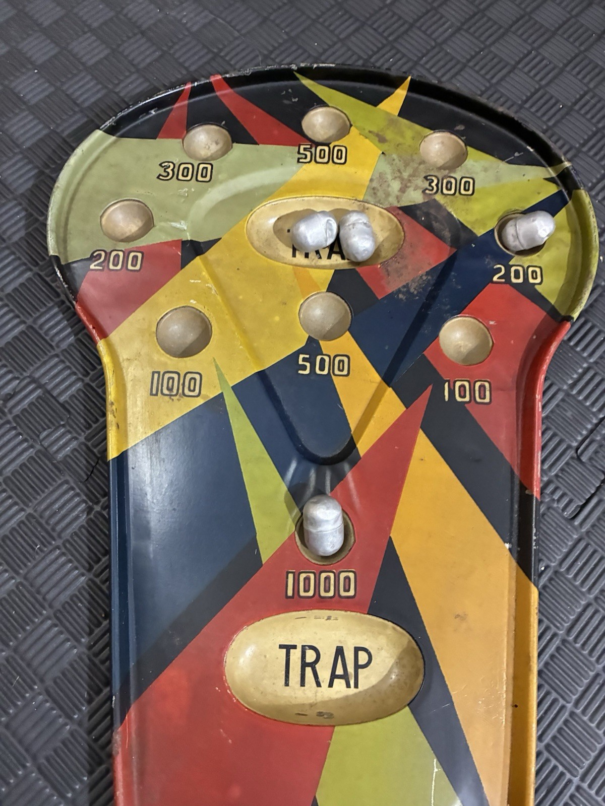 vintage “Tumble Bugs” tabletop game from the early 20th century.