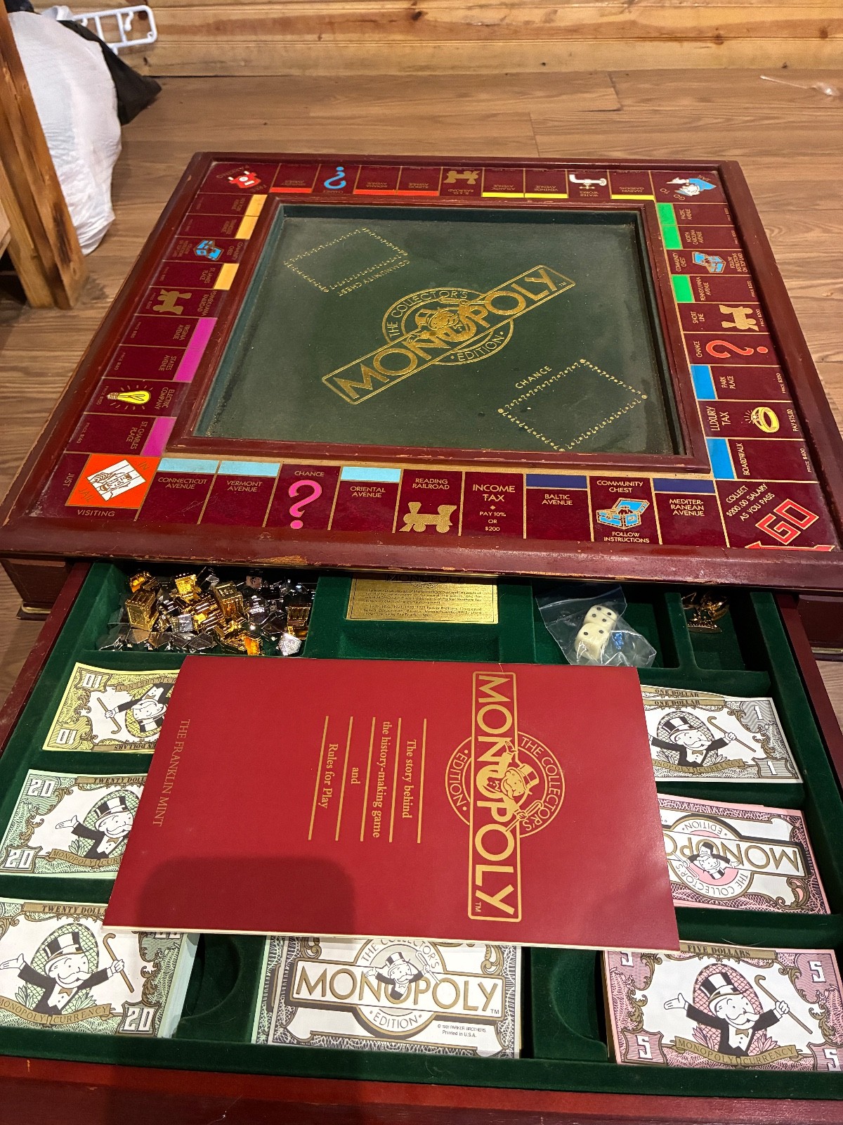Original classic wooden monopoly board. Has all pieces and all money