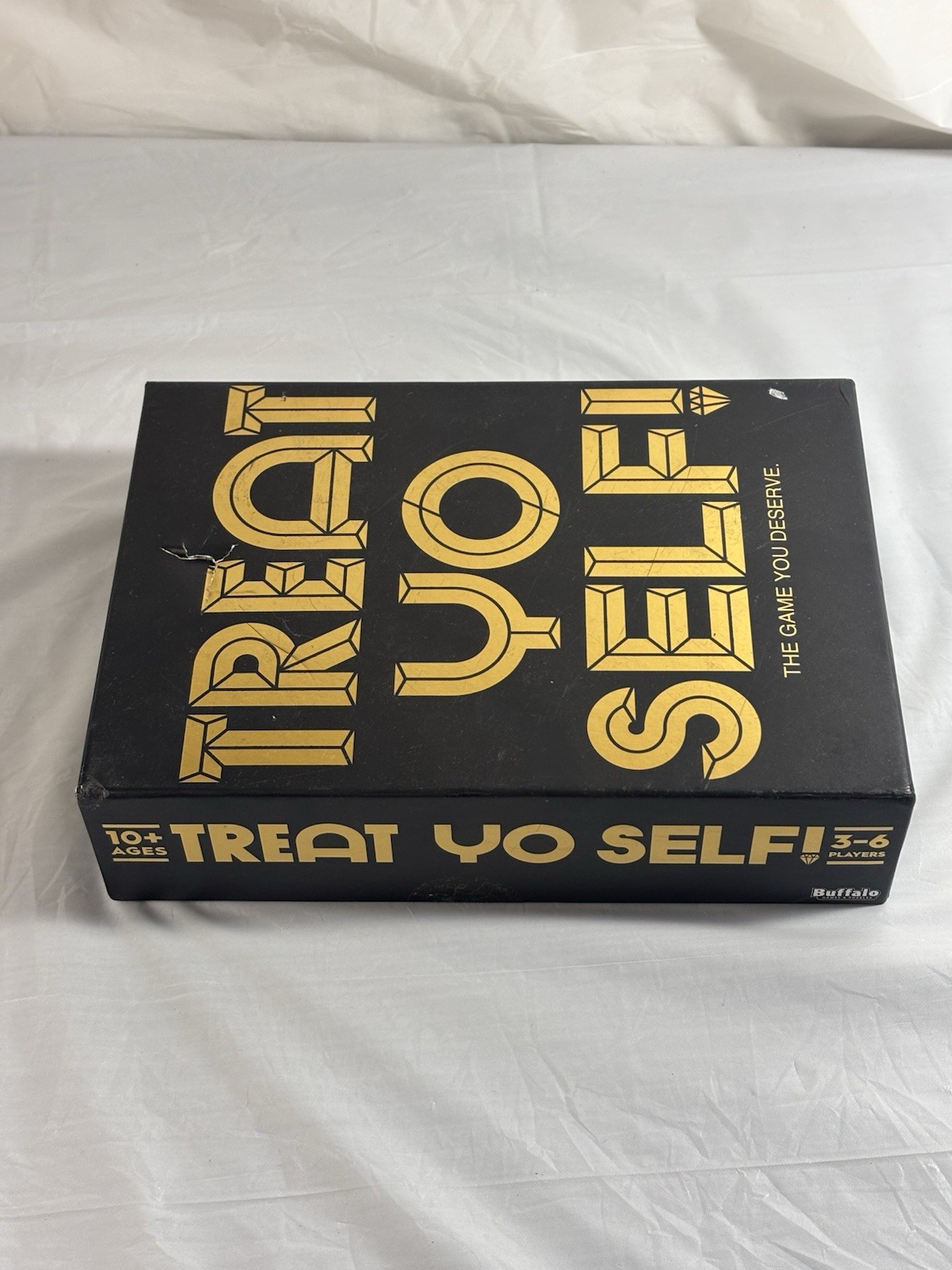 Treat Yo Self! The Game You Deserve. A Bidding and Bluffing Family Strategy Game