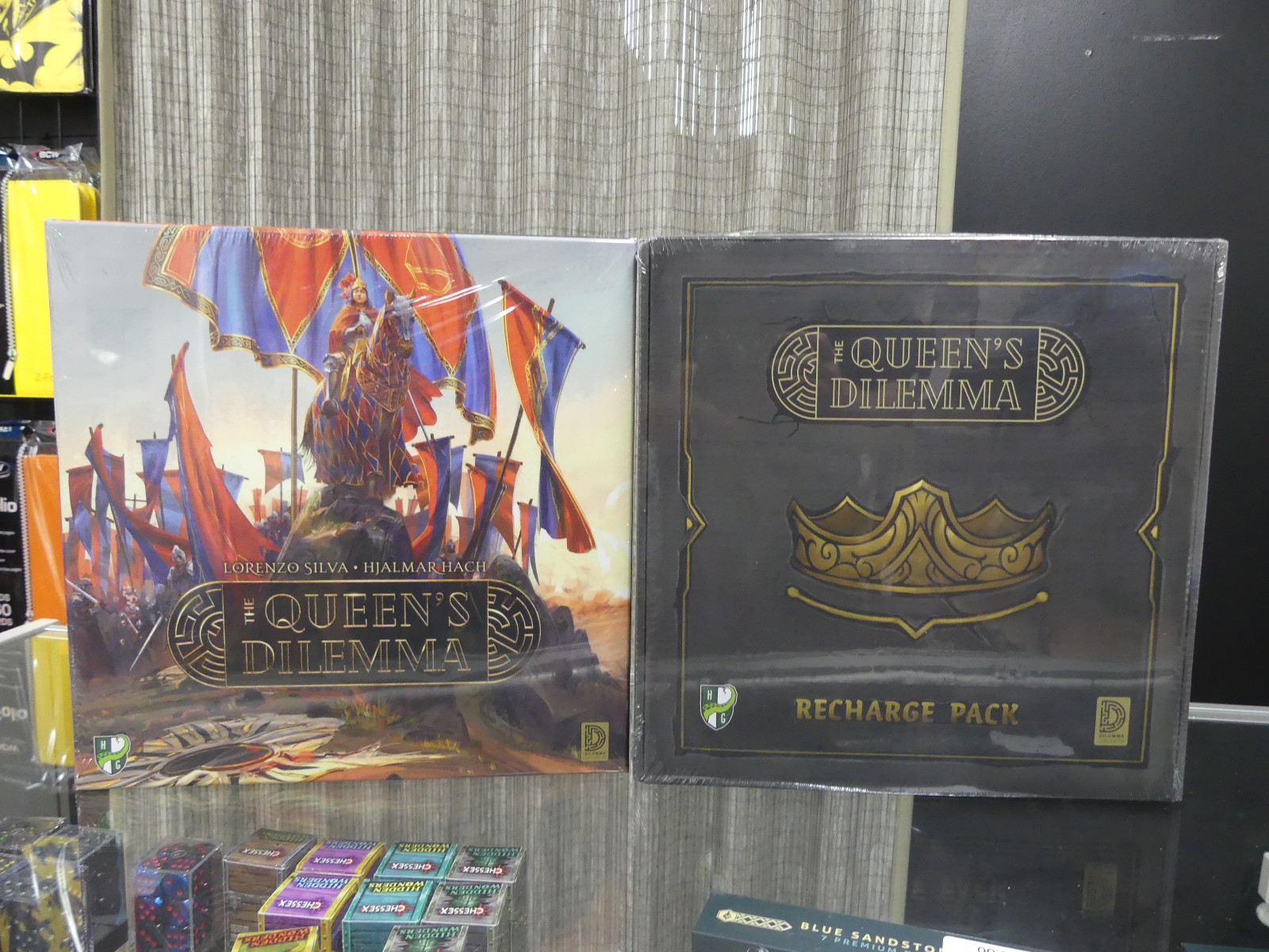 Queen’s Dilemma Boardgame and Recharge Pack Horrible Guild Game Studio