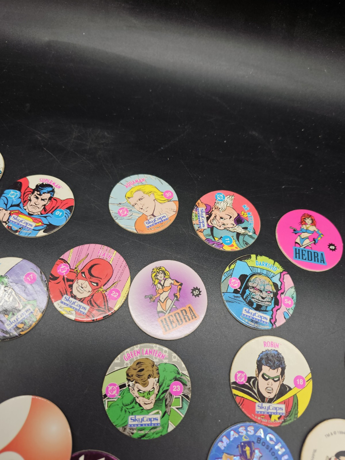 POGS Lot DC comics Sports 8 Ball Disney Poison Red Wings Slammer