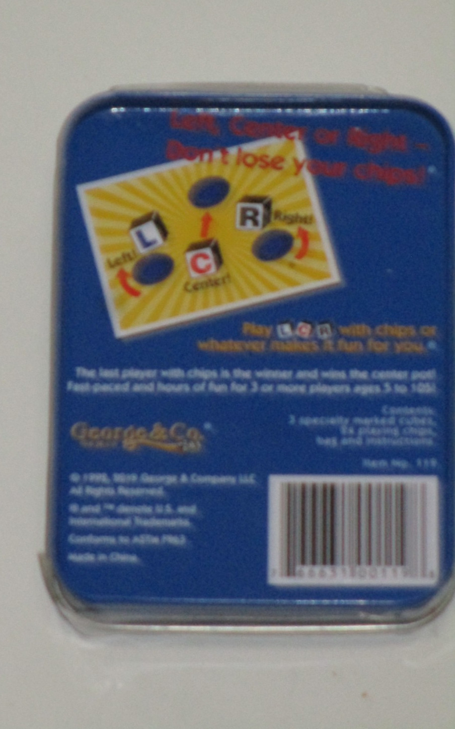 LCR® Left Center Right™ Dice Game – Blue Tin