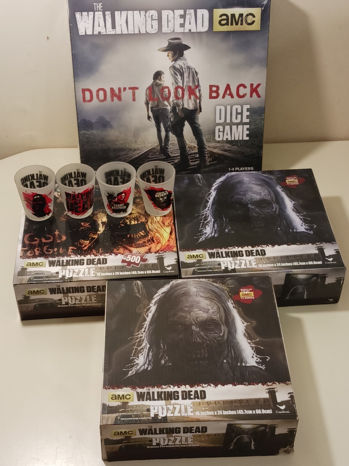 The Walking Dead Lot 4 Shot Glasses 1 Dice Game 3 Jigsaw Puzzles 1 Wall Clock