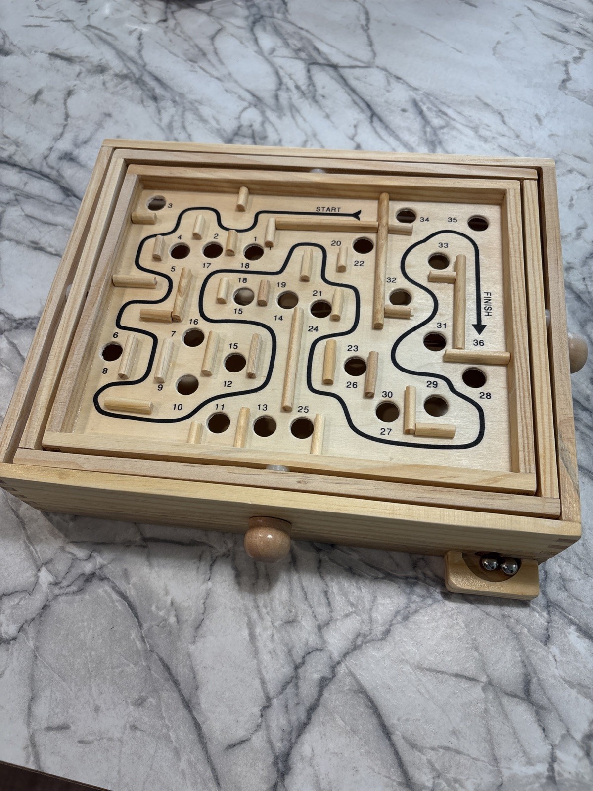 Labyrinth wood tabletop game.