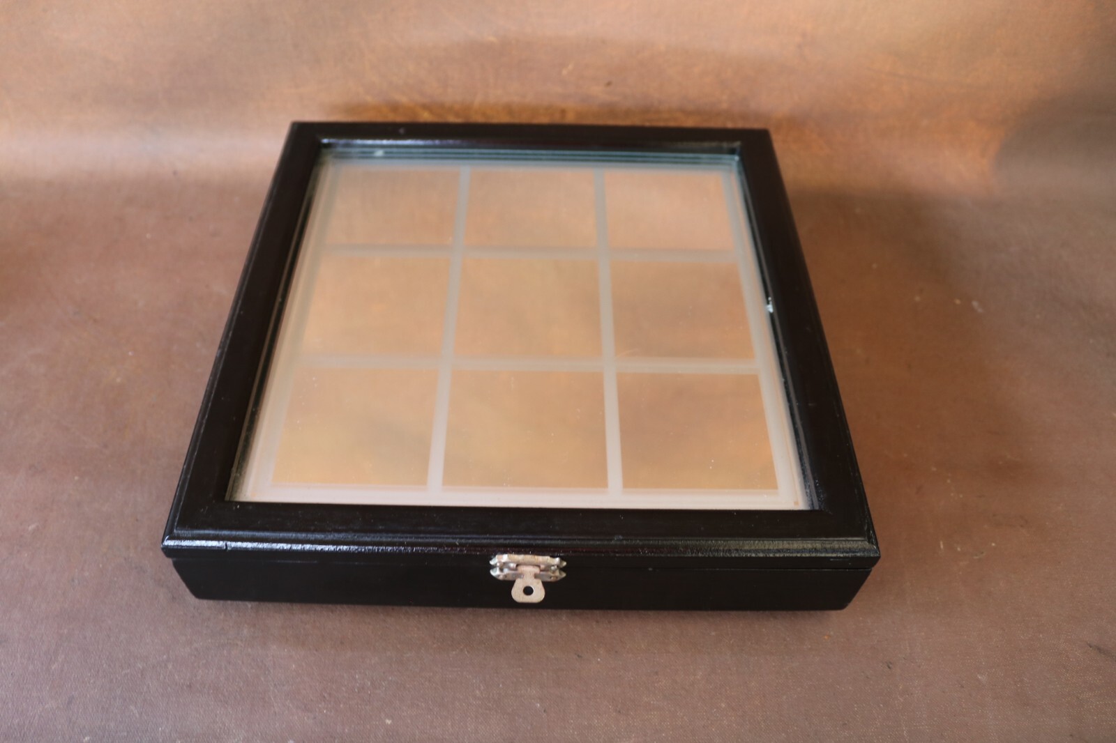 Tic-Tac-Toe Board Game featuring acrylic tokens with a storage mirrored board