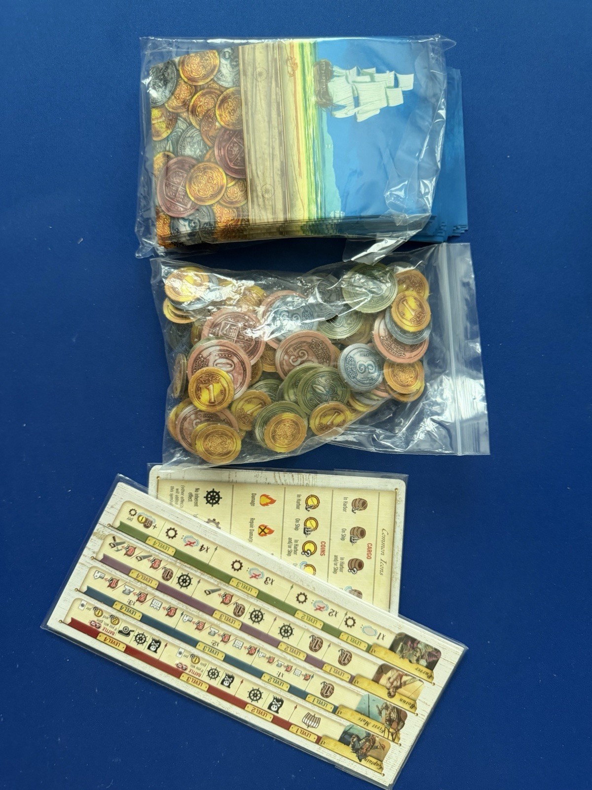 Dead Reckoning Kickstarter + Saga 1 – 2 + Ghost Ship + Metal Coins + Resources