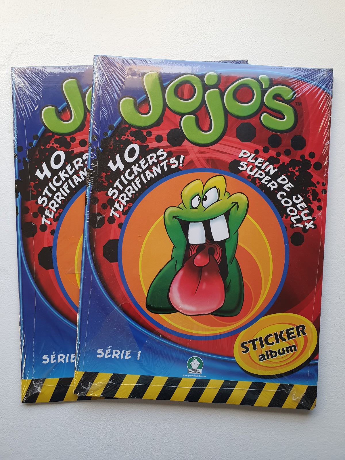 Rare Dracco Heads / Jojo’s sticker album – Gogo’s Crazy Bones-like