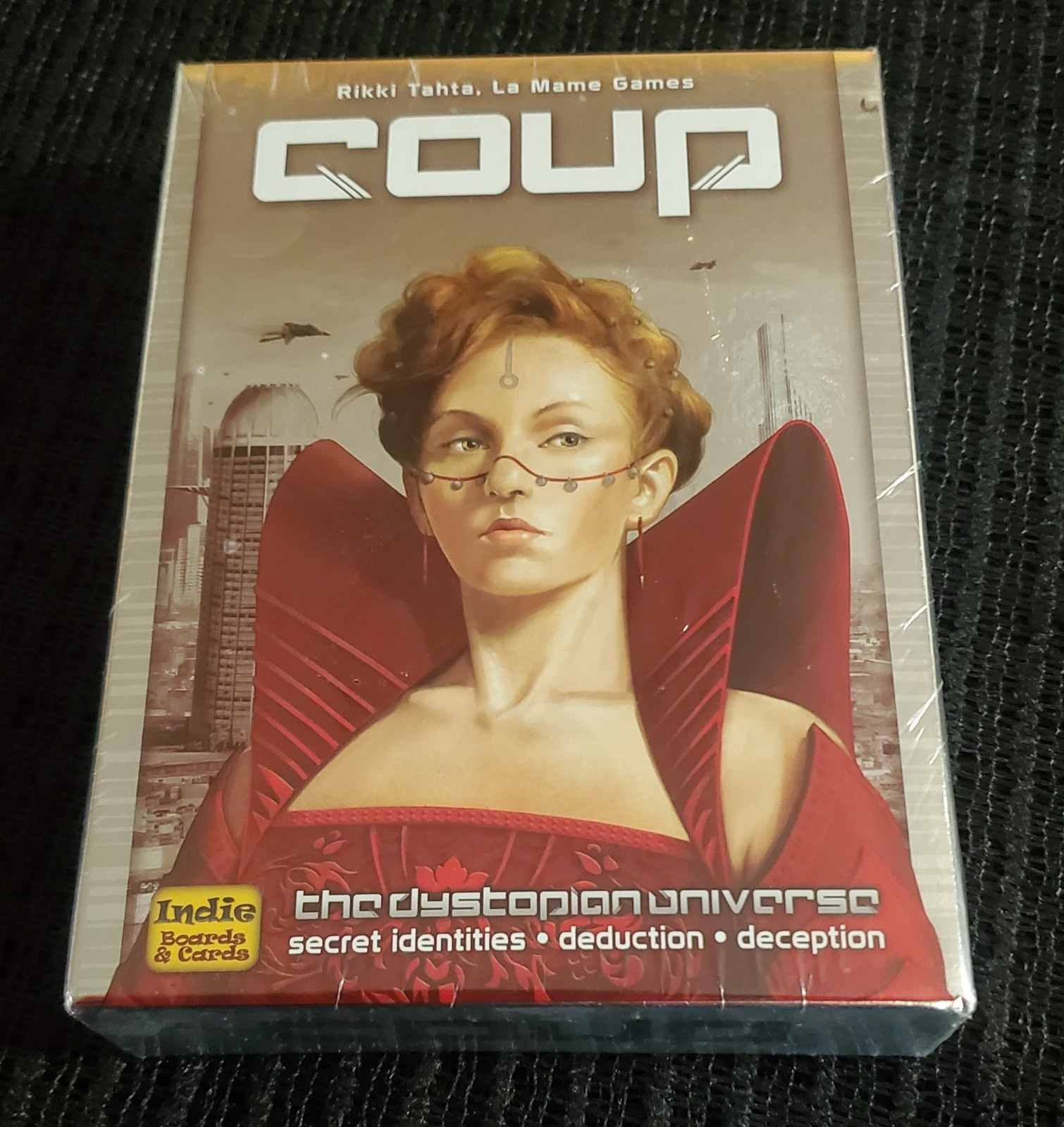 Coup: The Dystopian Universe Card Game Indie Boards and Cards by La Mame Games.