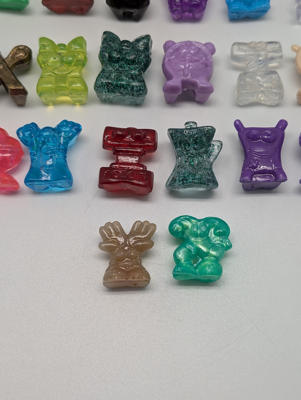 Lot of 25 Miscellaneous Crazy Bones from 1998 on – Things, Sports +more!