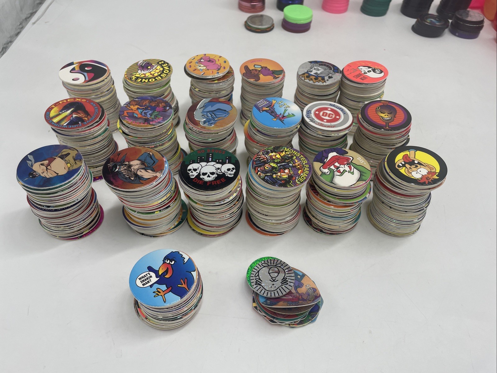 Large POGS Lot (825+ Milk Caps, 130+ Slammers, 10 Game Pads, 13 Tubes)