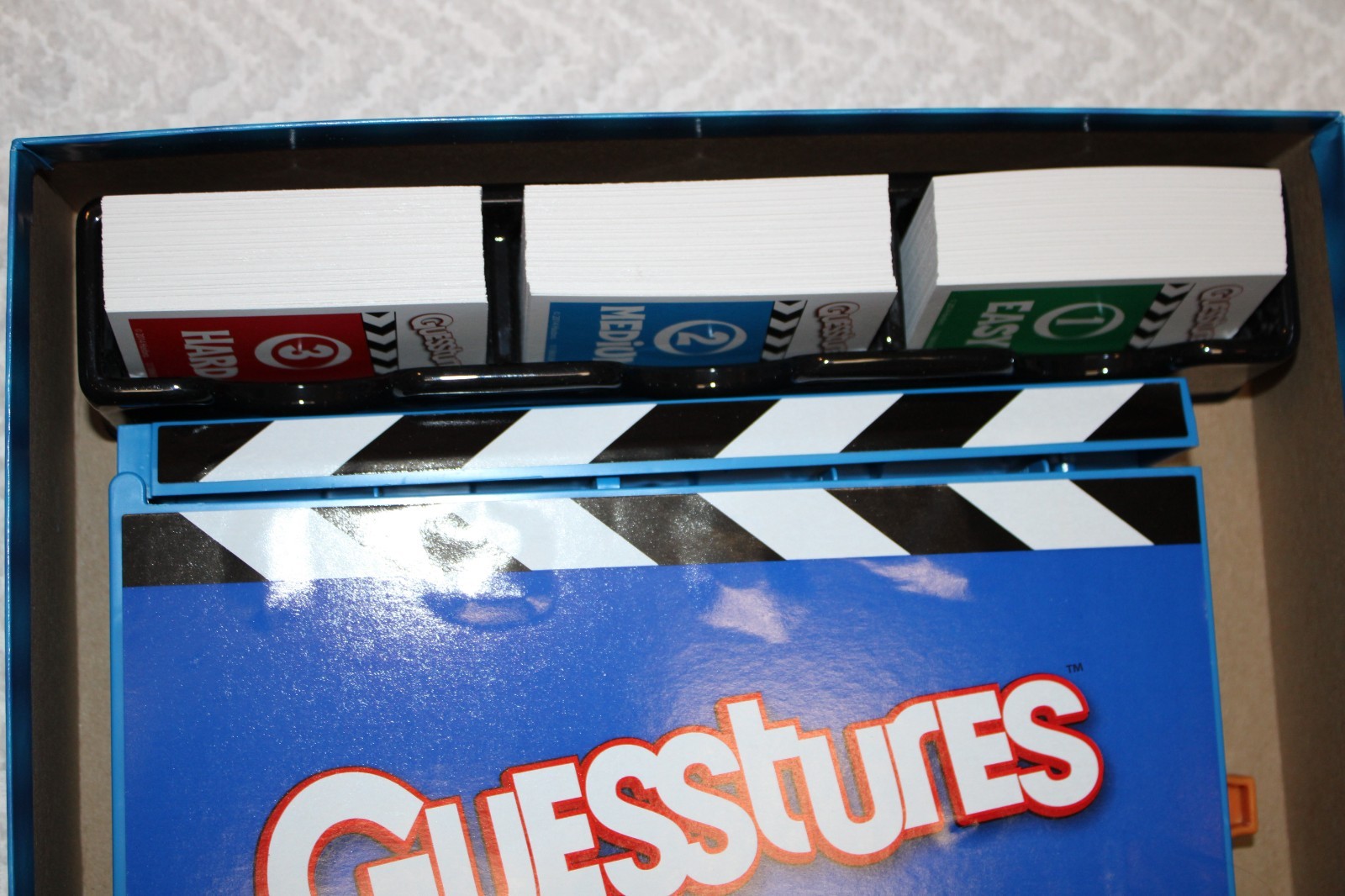 Hasbro Gaming Guesstures Game Charades Game for 4 or More Players Family Party