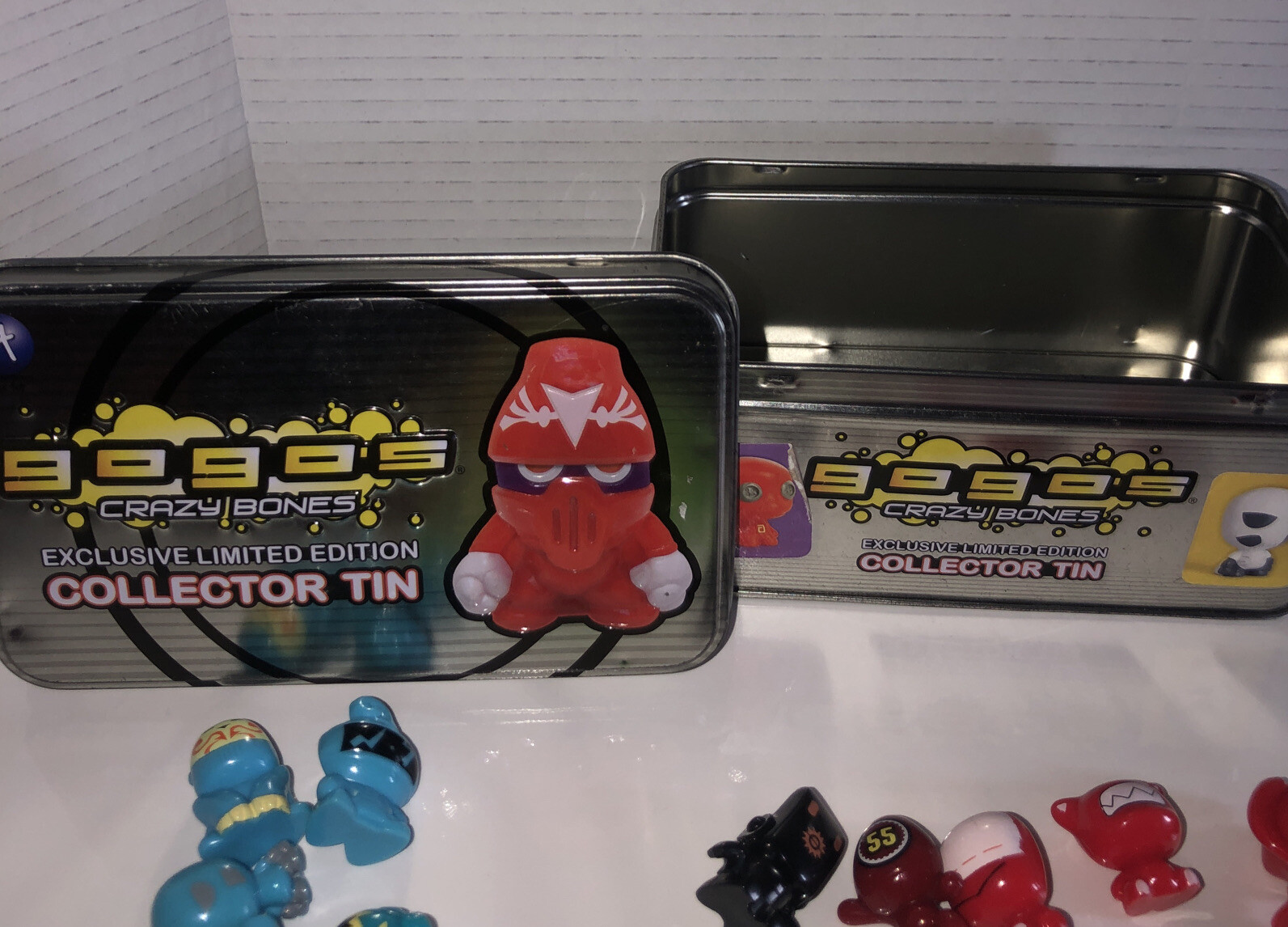 Gogos’ Crazy Bones Figures x 35 Lot Bundle and tin with stickers on it. see pic.