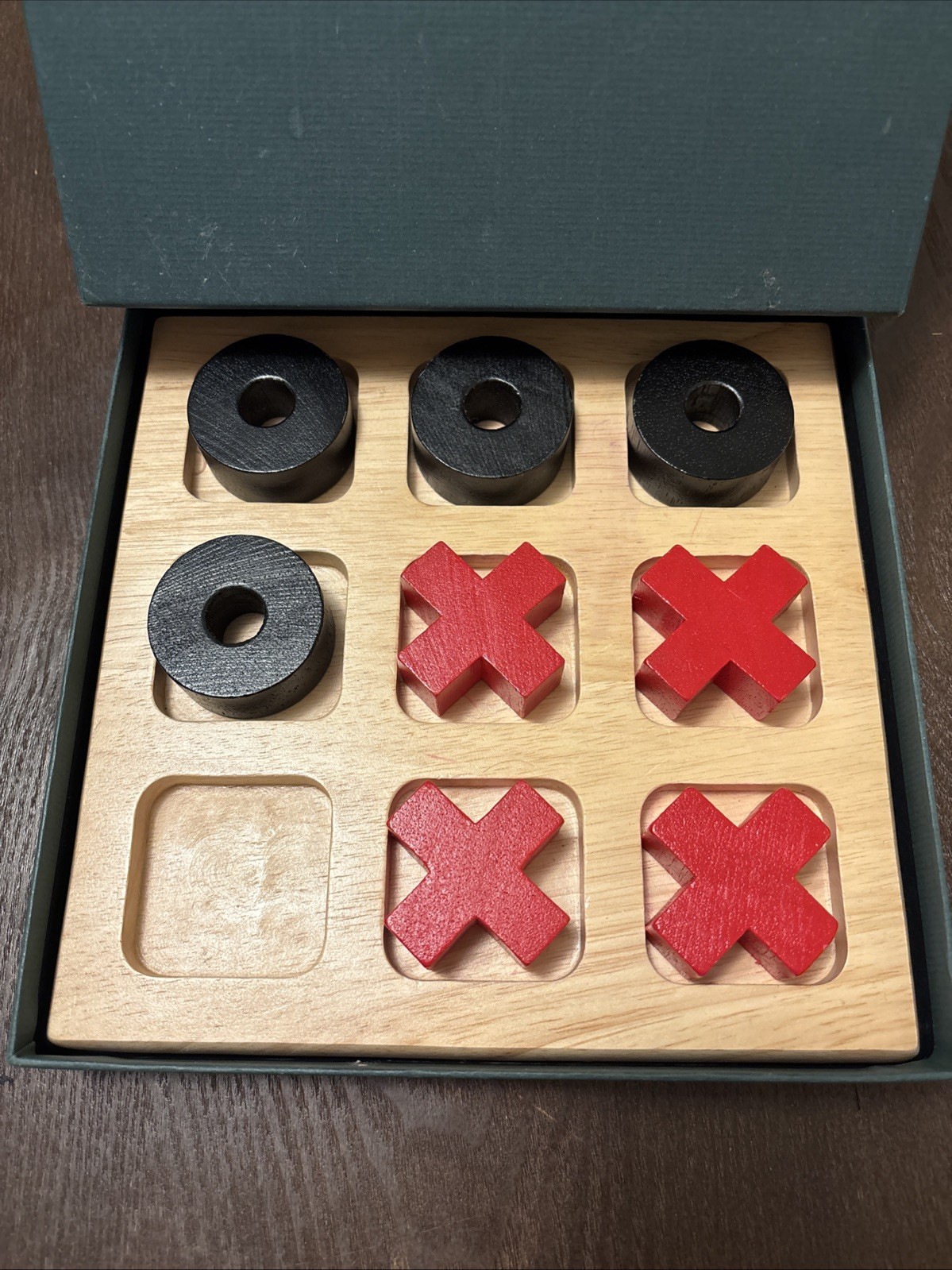 Learningsmith containing a tic-tac-toe game, 9-piece set