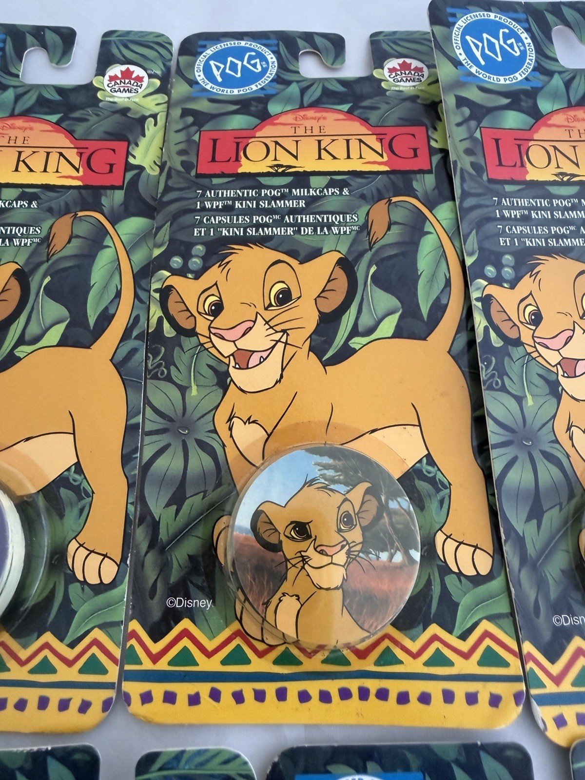 The World Pog Federation Lot of 7 The Lion King Carded Pogs with Slammer New