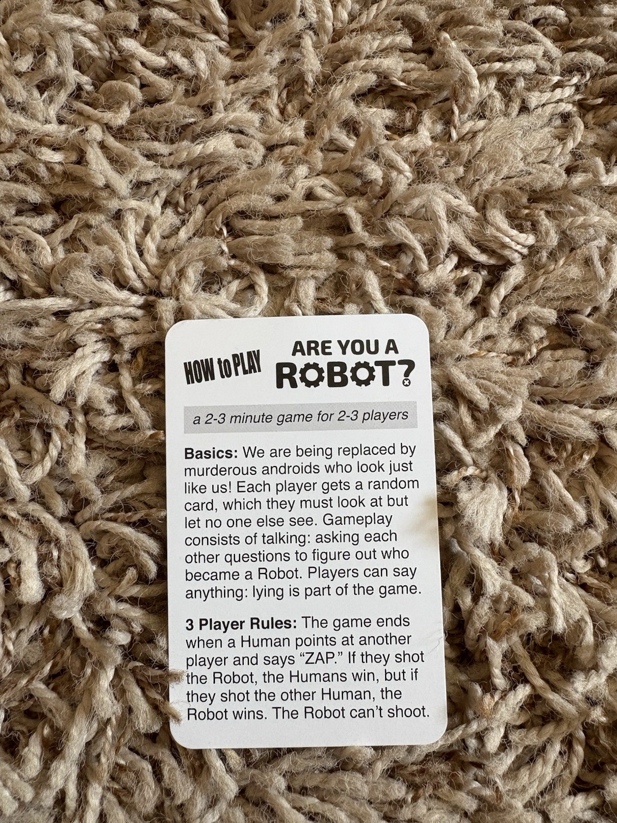 Are You a Robot? A Social Deduction Micro-Game 2-3 Players By Looney Labs