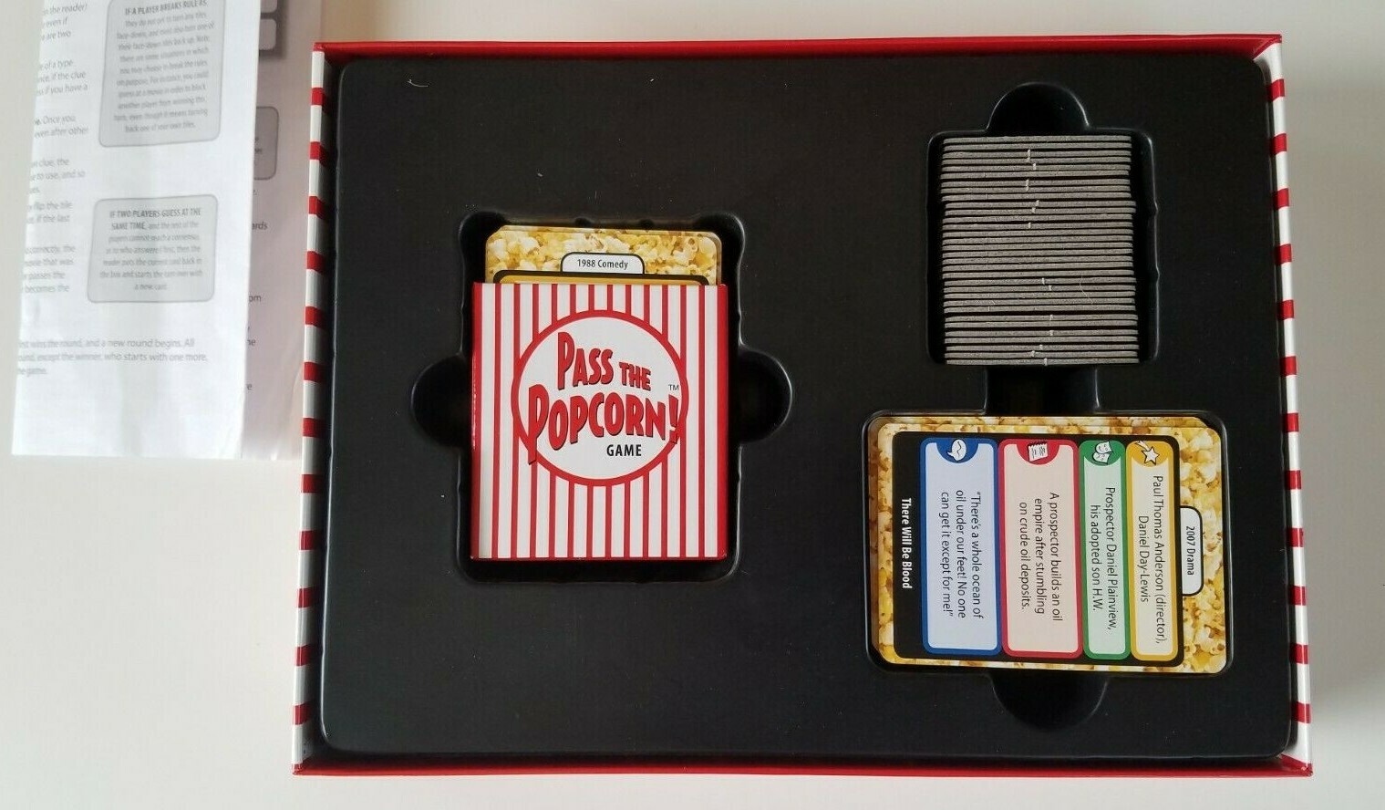Pass the Popcorn! Game Fast-Paced Movie Fun 2008 Ages 12+ for 2 to 8 Players.