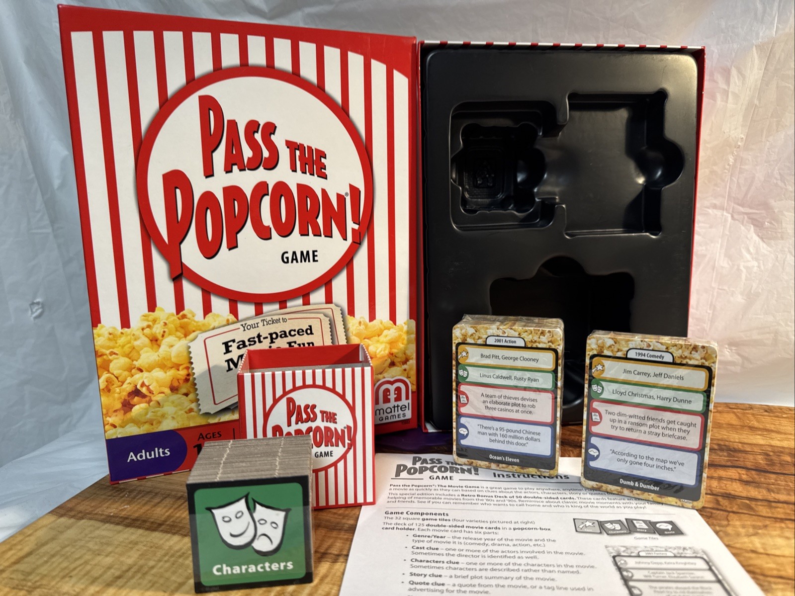 Pass the Popcorn Trivia game. New and complete . Open box.