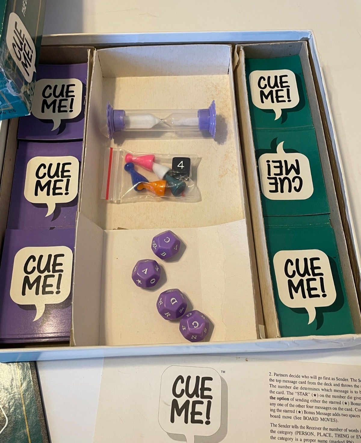 Cue Me! The Exciting Game of Hints and Guesses, 3-8 Players, Ages 12+