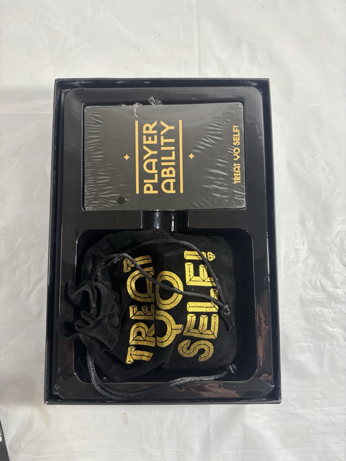 Treat Yo Self! The Game You Deserve. A Bidding and Bluffing Family Strategy Game