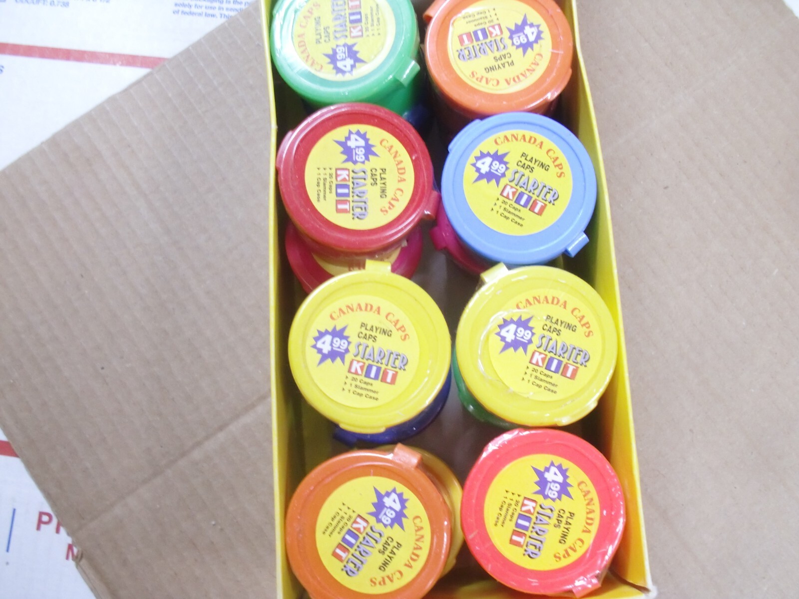 POGS/MILKCAPS CANADA CAPS STARTER KITS BOX WITH 16 STARTER POG KITS IN CANISTERS