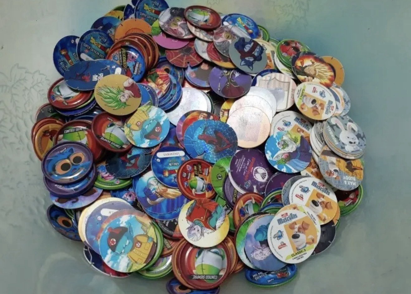 90 Mixed Tazos Lot PacMan Spider-Man Dragon Ball Pokemon + 1 Tazo Holder Vintage