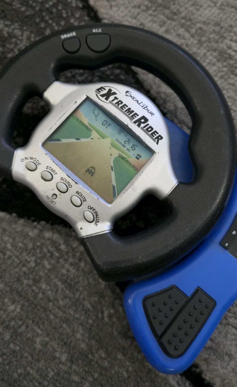 EXCALIBUR Extreme Rider Electronic Handheld Travel Game