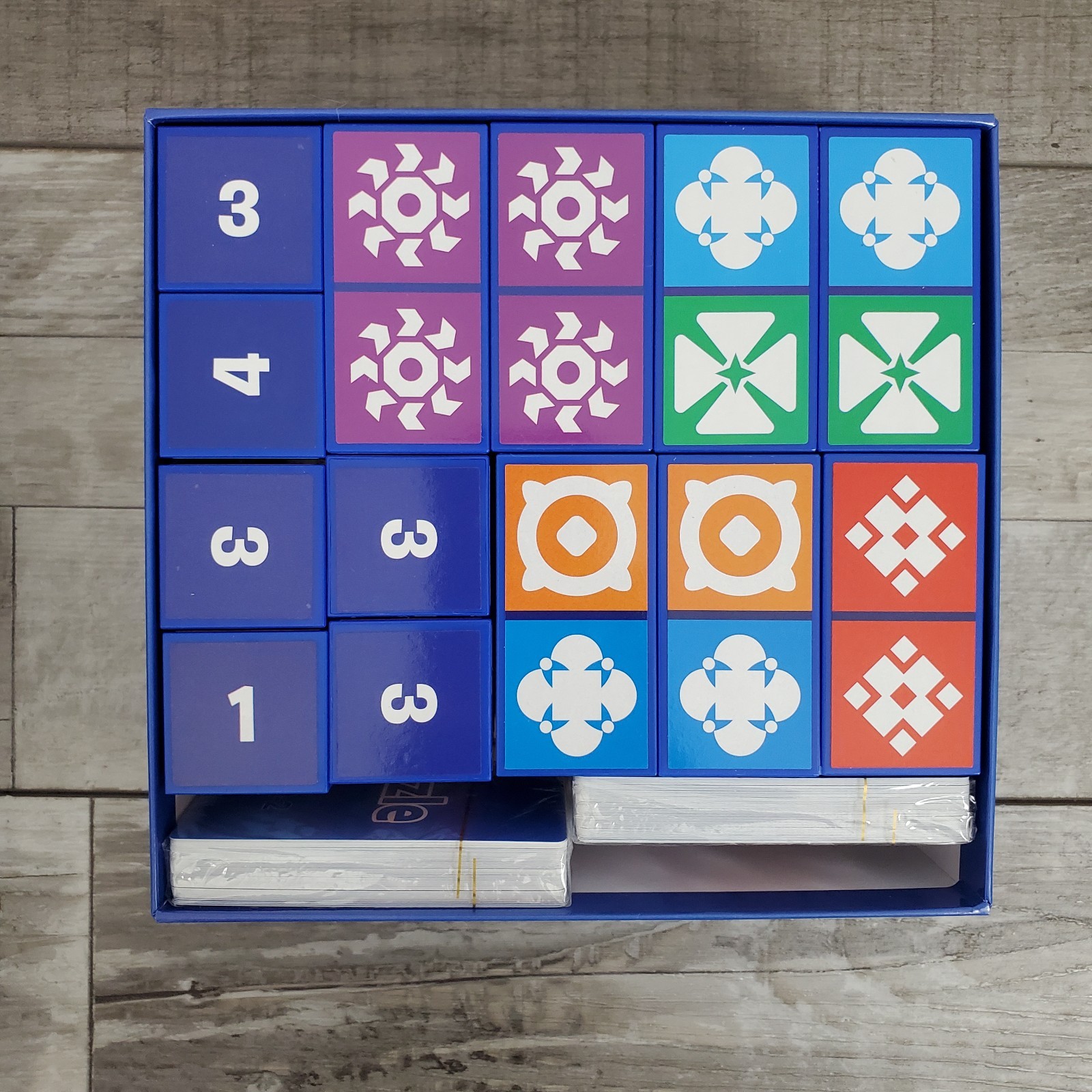 The Uzzle Board Game and Uzzle Expansion 1