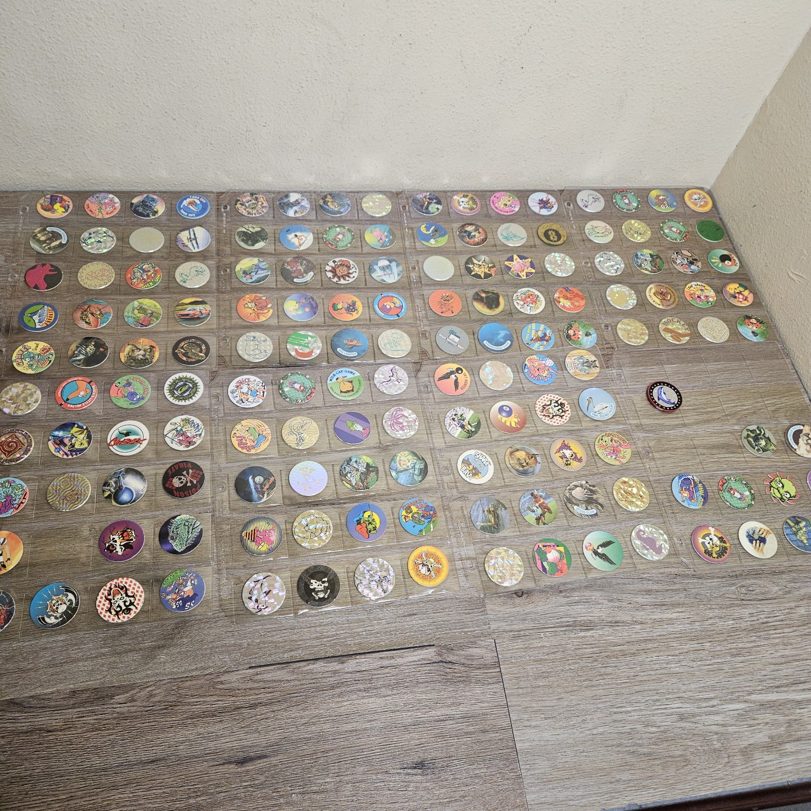 Vintage 1990s Mix Lot of 150 Pogs and 1 Metal Slammers Plus Binder Sleeves