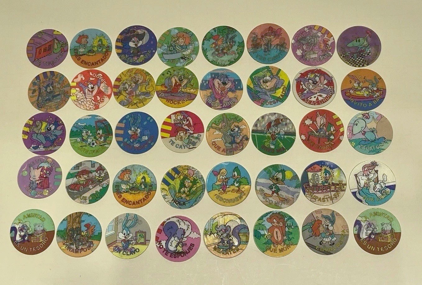 Vintage Set Of “40” LOONEY TUNES HOLOGRAPHIC TAZOS (POGS) /SABRITAS MEXICO 1994