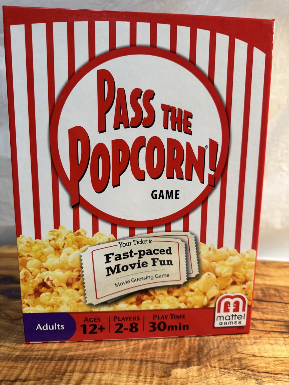 Pass the Popcorn Trivia game. New and complete . Open box.