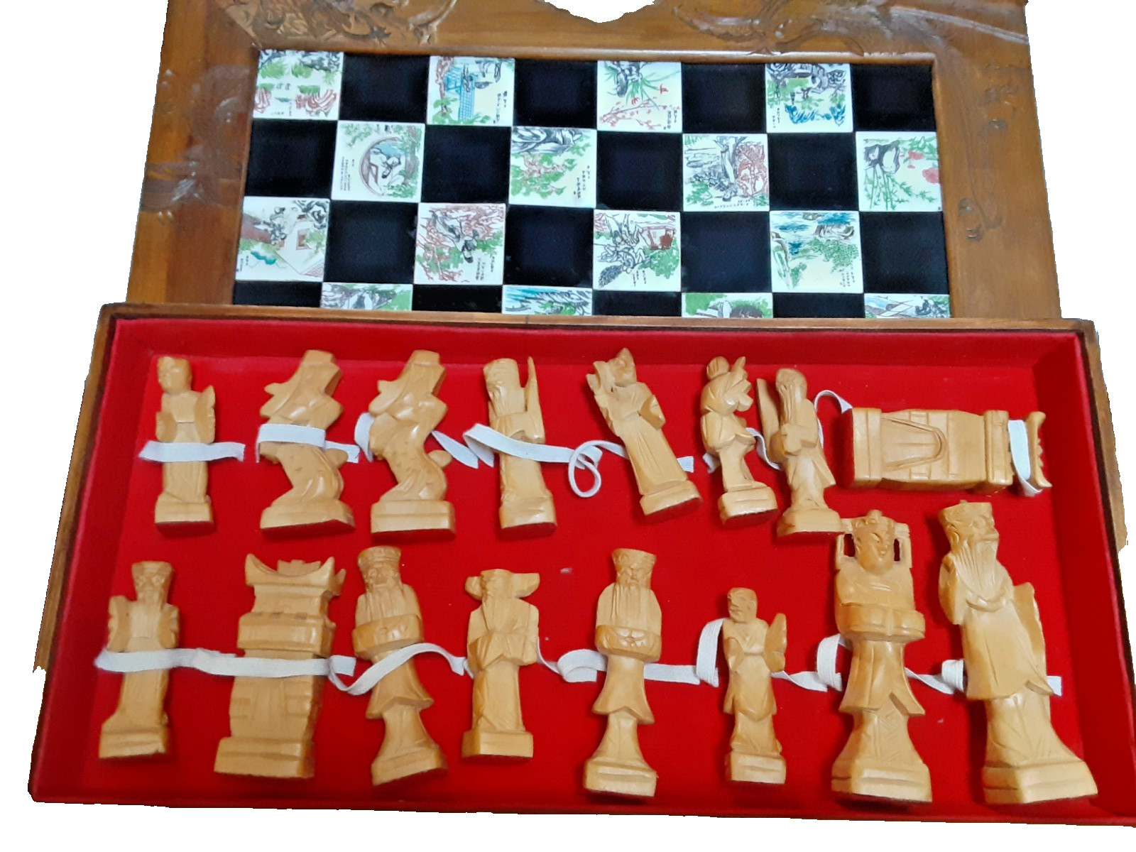 Antique handmade chess set made of natural wood and ceramic